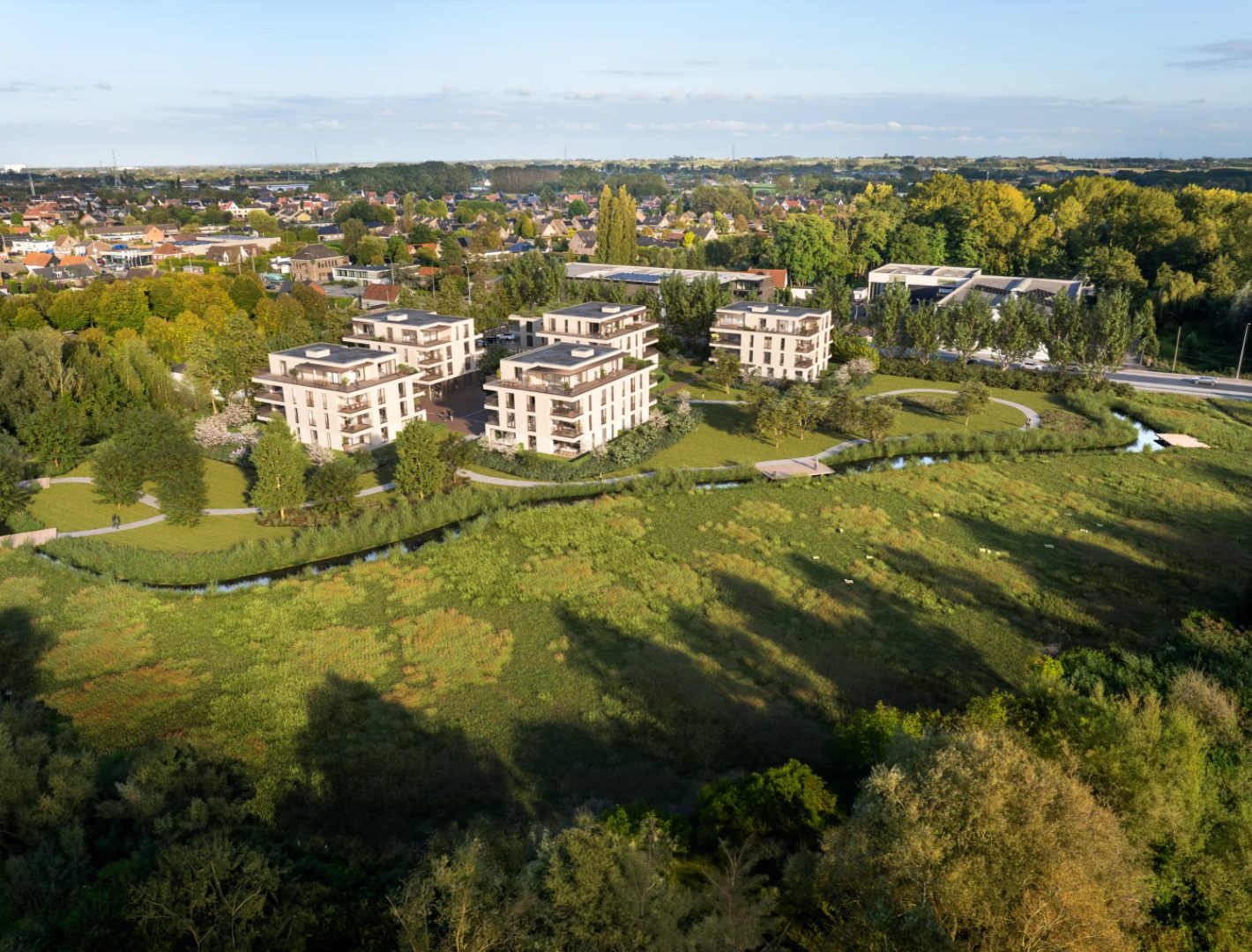 Aerial view of a residential project along the river